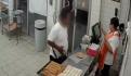 Hombre impide asalto al lanzarle un tanque de gas en la cabeza al ladrón (VIDEO)