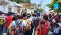 Migrantes se enfrentan a Guardia Nacional en Tapachula, Chiapas; reportan 3 heridos (VIDEOS)