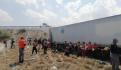 Rescatan en Tlaxcala a 431 migrantes hacinados en 2 tráileres