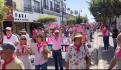 Marcha en defensa del INE. Bloqueador, playeras rosas y “lomitos”: así llegaron miles al Zócalo