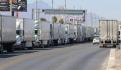 Suman casi 19 mil los vehículos de carga impedidos de cruzar puentes fronterizos por crisis migratoria: FPFCH