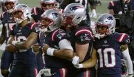 Jugadores de los Patriots celebran un touchdown contra los Ravens en la Semana 10 de la NFL.