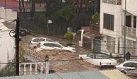 Inundaciones en al menos tres municipios del Estado de México por la instensas lluvias, ayer por la tarde.