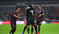 Jugadores de la Selección Mexicana celebran un gol contra Jamaica en las eliminatorias rumbo a Qatar 2022.