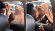 Un hombre ofreció un billete a una mujer en situación de calle, a cambio de simular un beso