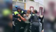 Guardia Nacional aclara relación con sujeto que agredió a dos policías en Puebla.