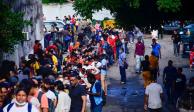 Migrantes hacen filas en las oficinas de la Comar, en Chiapas, en mayo pasado.