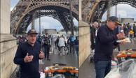 Hombre vende elotes frente a la Torre Eiffel. Foto: Especial