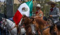 Aspectos del Desfile por el CCXII Aniversario de la Independencia de México realizado de la ciudad de Toluca en donde participaron 8 escoltas, 3 mil 379 elementos, 255 vehículos, siete carros alegóricos, 102 binomios equinos y 36 binomios caninos.