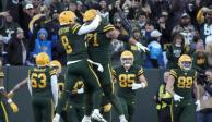 Jugadores de los Green Bay Packers festejan un touchdown en uno de sus partidos en la NFL.