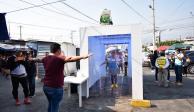 En algunas plazas del país se colocaron filtros y carpas de sanitización, aunque su utilidad contra el coronavirus no está demostrada.