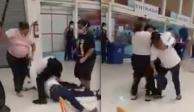 Una mujer le quita tolete a guardia de un supermercado para golpearlo con éste.