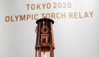La llama de los Juegos Olímpicos en despliegue en el Museo Olímpico de Tokio.