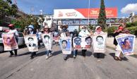 Familiares de los jóvenes desaparecidos marchan en Guerrero, el pasado 12 de diciembre.