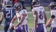 Jugadores de los Ravens celebran una anotación ante los Titans en los Playoffs de la NFL.