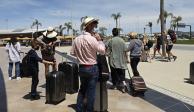 Vacacionistas arriban al aeropuerto de Portugal, el pasado 17 de mayo.
