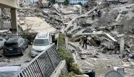 Suman 12 muertos por derrumbe en Miami; aún buscan a 149