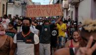 Gente protesta contra el gobierno de Cuba en La Habana durante la pandemia de coronavirus
