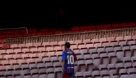 Un fanático del Barcelona con el jersey de Messi en el Camp Nou