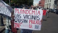 Manifestantes en Querétaro reclaman que la pandemia "es una farsa" y rechazan el cubrebocas
