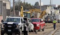 Autos calcinados fueron retirados ayer de la zona cero en Xochimehuacan, Puebla.