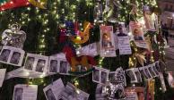 Las mujeres colocaron fotografías de los deudores alimentarios en el árbolde Navidad.&nbsp;