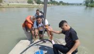 INM rescata a tres personas y recupera un cuerpo que flotaba en el Río Bravo.
