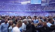 Fans del Manchester City celebran el título de la Premier League de Inglaterra.