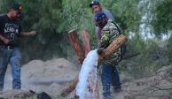 Extracción de agua en los pozos de extracción de carbón, donde 10 trabajadores quedaron atrapados, en una mina de Sabinas, Coahuila