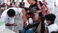 Menores de 5 a 11 años reciben su vacuna contra el Covid-19 en Cancún, ayer.