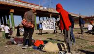 Migrantes protestan por las nuevas políticas migratorias, en Ciudad Juárez, ayer.