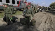 Reclutas rusos caminan para tomar un tren en Volgogrado, el 29 de septiembre.