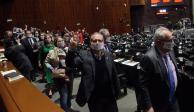 Diputados de oposición protestan durante la discusión de leyes secundarias, el pasado 6 de diciembre.