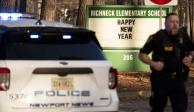 La policía responde a un tiroteo en la Escuela Primaria Richneck, el viernes 6 de enero de 2023 en Newport News, Virginia