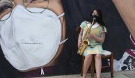 La saxofonista Maria Elena Ríos, quien fue atacada con ácido, acudió a la inauguración del mural Nucuāj (Fuerza en lengua triqui de San Juan Copala), en el que fue plasmada su imagen, en el Barrio de Xochimilco de Oaxaca en octubre de 2022