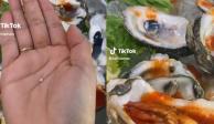 Joven va a restaurante a comer ostiones y se encuentra una perla (VIDEO)