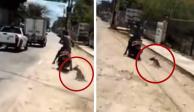 La secuencia de imágenes muestra el momento en que un motociclista arrastra a un perro por la calle