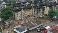 Derrumbe de un edificio cobra al menos cinco vidas; reportan ocho desaparecidos