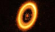 Esta imagen, tomada con el conjunto de telescopios Atacama Large Millimeter/submillimeter Array (ALMA), muestra el joven sistema planetario PDS, situado a casi 400 años luz de la Tierra. Los astrónomos han descubierto lo que podrían ser dos planetas que comparten la misma órbita alrededor de su estrella. Dicen que es la prueba más contundente hasta el momento de esta extraña pareja cósmica, de la que existían sospechas, pero no pruebas. Los investigadores publicaron su hallazgo el miércoles 19 de julio de 2023.