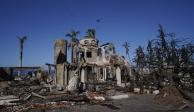 Un inmueble quedó reducido a ruinas tras el voraz incendio forestal en Lahaina, Hawái, de acuerdo con esta imagen tomada el sábado 12 de agosto de 2023
