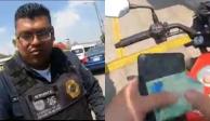 Captan a policía pidiendo 'mordida' a motociclista en CDMX.