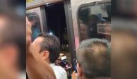 La imagen muestra el momento en que la puerta de un vagón del Metro, en la Línea 9, se abre