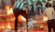 Aficionados del Atlético Nacional prenden fuego al estadio en el clásico ante Millonarios