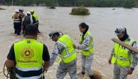 Elementos de PC Y GN en Tamaulipas, en labores de rescate en el río Guayalejo, ayer.