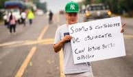 Cortadores de aguacate en Michoacán solicitan apoyo a la población, el 21 de junio.