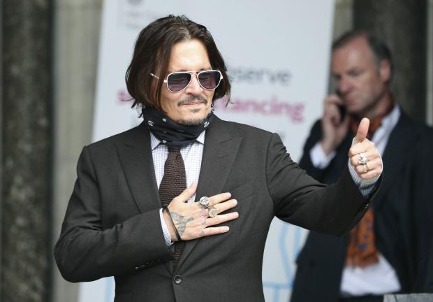 El actor Johnny Depp al arribar a la Corte Suprema de Londres, donde tiene lugar el juicio de la demanda por difamación que interpuso contra The Sun.