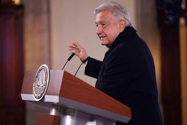 Presidente López Obrador celebró fin de huelga en Audi.