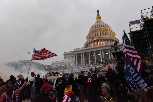 Police clear the U.S. Capitol Building with tear gas as supporters of U.S. President Donald Trump gather outside, in Washington, U.S. January 6, 2021. REUTERS/Stephanie Keith