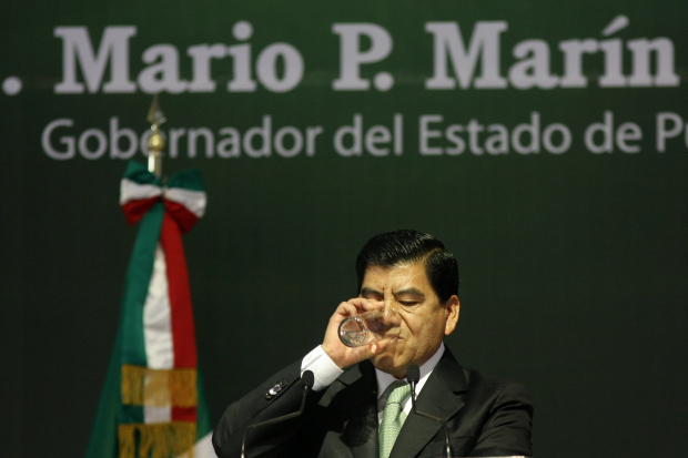 Mario Marín, al rendir su último informe de gobierno en Puebla, en 2011.