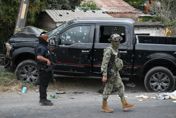 Policías y soldados acordonaron la zona del ataque, en el Puerto de Veracruz, el domingo 22 de enero.